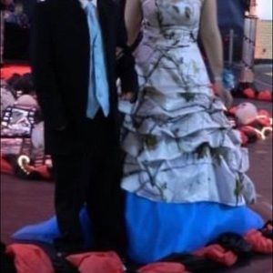 Sz 14 Realtree snow camo with blue lace up back